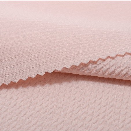 In-stock 220 diagonal bubble polyester and ammonia elastic bubble twill fabric with jacquard particles, a new fast fashion clothing fabric Item Picture