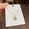 This Japanese and Korean fashion, light luxury, slightly inlaid zircon flower planet necklace is a unique and stylish design with a versatile collarbone chain accessory details Picture