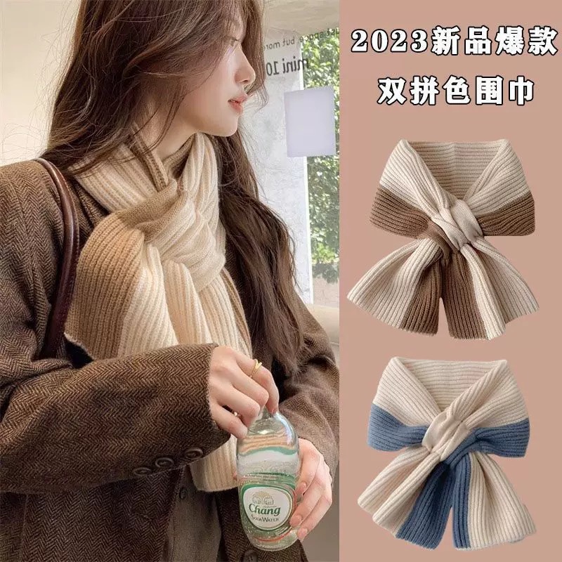 This women's autumn and winter scarf exudes a sense of high-end warmth and warmth. It features a color-blocked knitted cross yarn that is fashionable and cute. It's a winter scarf for young girls details Picture