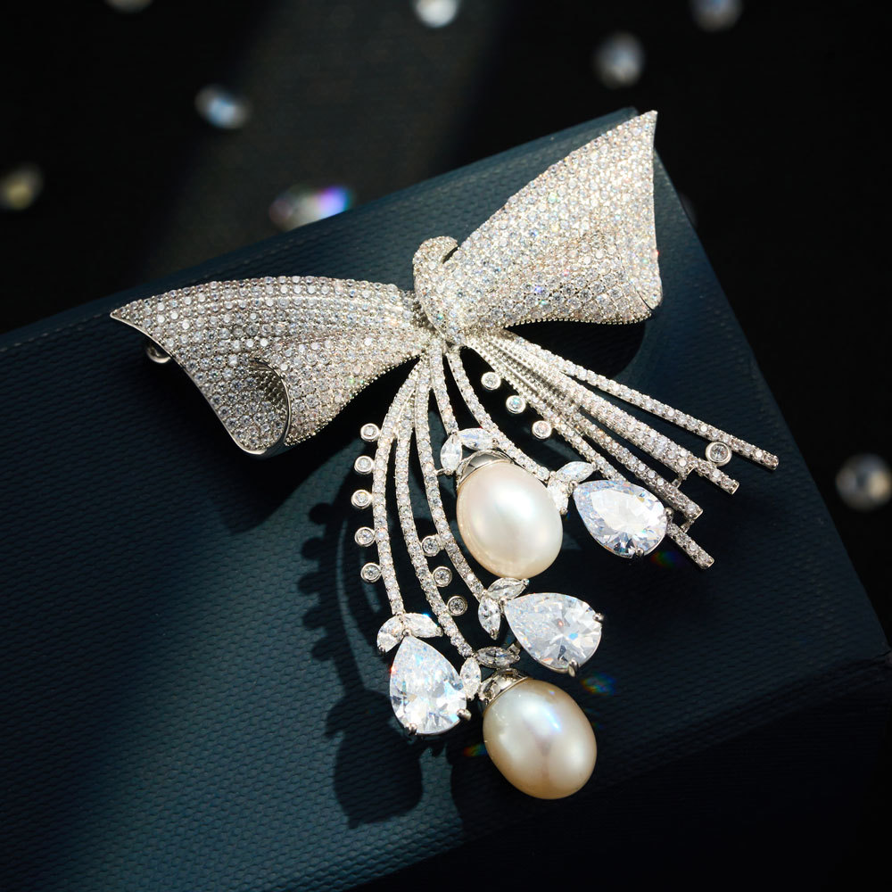 轻奢仙奢流苏蝴蝶结胸针铜合金真金电镀微镶锆石淡水珍珠精致别针