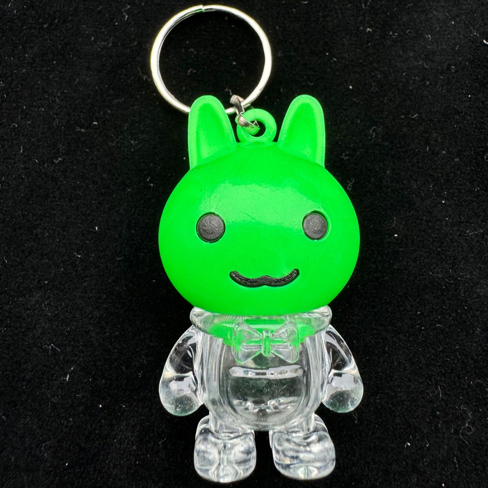 Cartoon rabbit-shaped keychain main body flowing sand oil toy Song Jin Little horse pendant keychain accessory Application Scenario