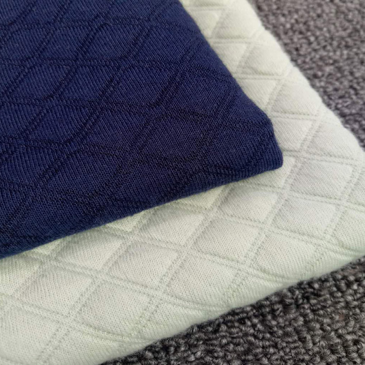 厂家现货针织菱形大小格子提花空气层面料涤氨tr服装家纺染色布