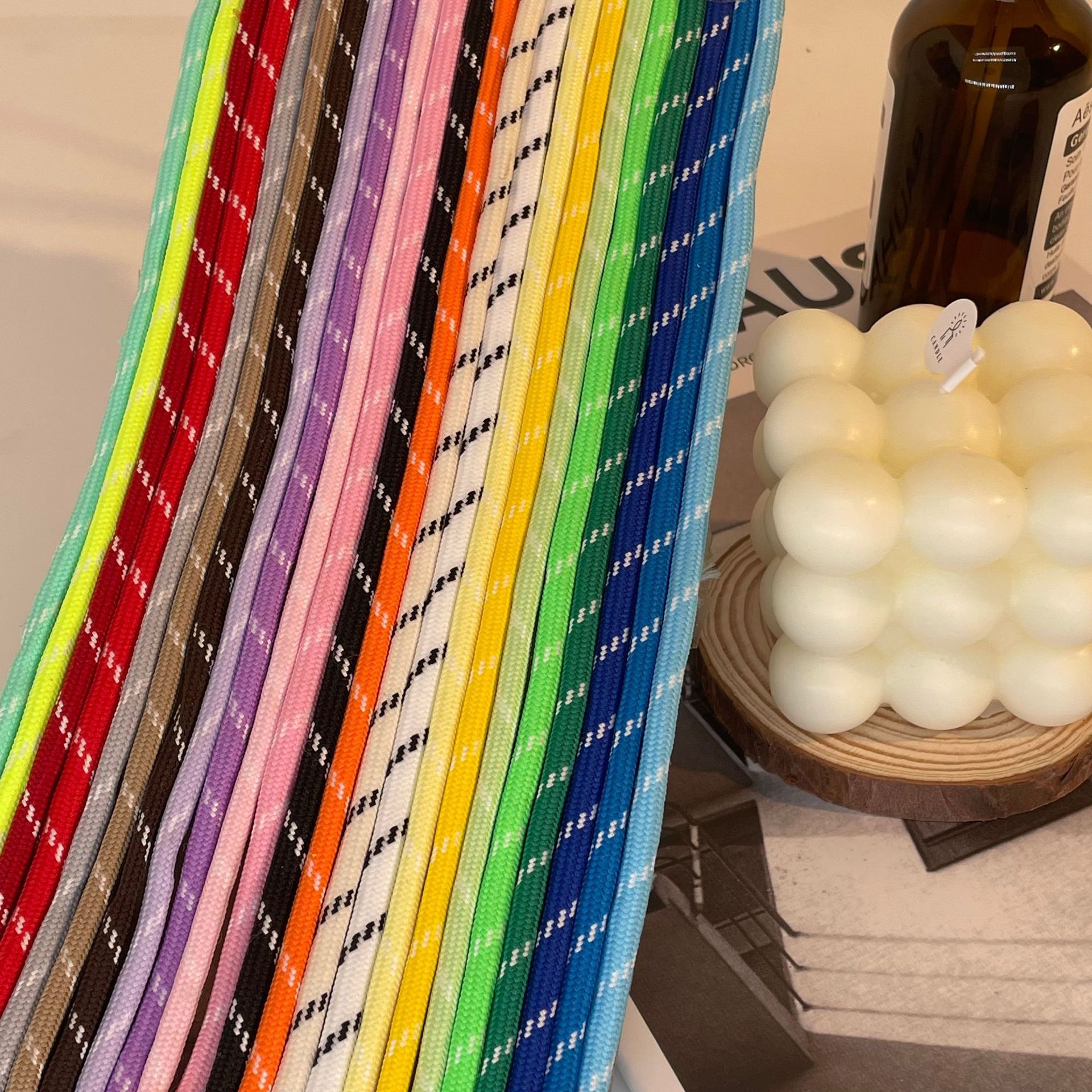 Wholesale and in-stock 5MM colored dotted polyester low-elasticity filament DIY hand-woven rope, mobile phone lanyard, shoelace semi-finished products Application Scenario