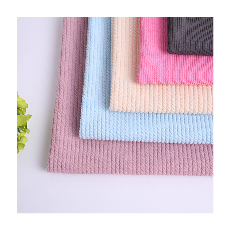 The manufacturer has in stock knitted diamond-shaped large and small checkered jacquard air layer fabric, polyester and ammonia tr clothing and home textile dyed fabric Application Scenario
