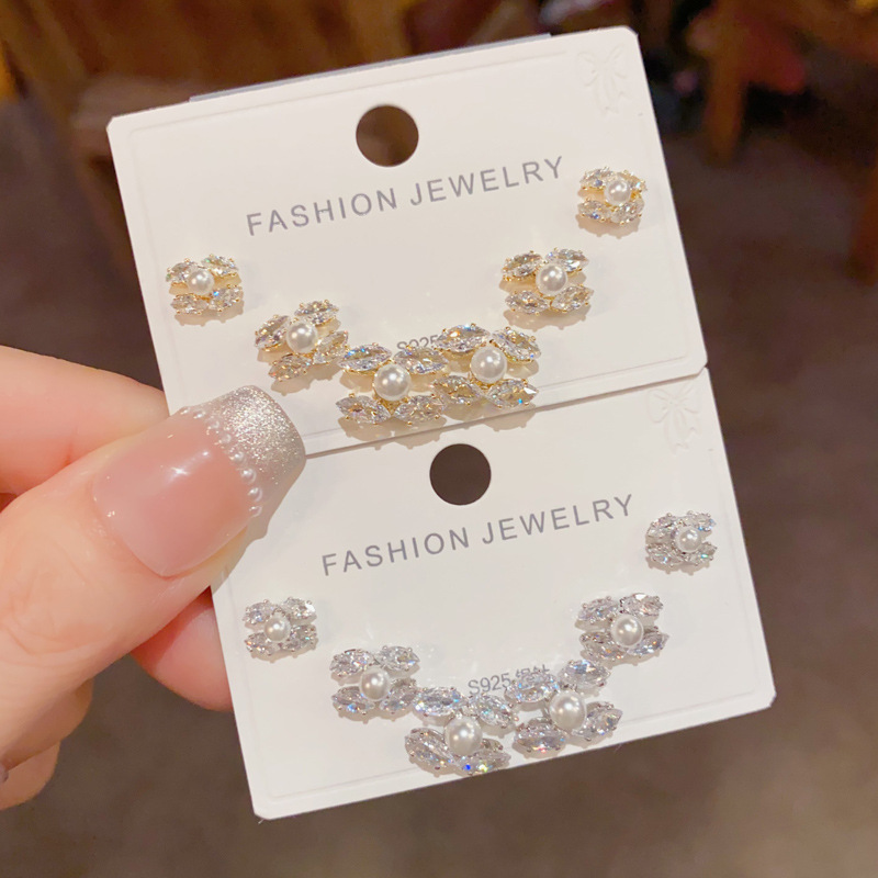 Wholesale of French Chanel-style zircon cross-pearl three-piece stud earrings, exquisite, fashionable and versatile, super shiny commuting earrings