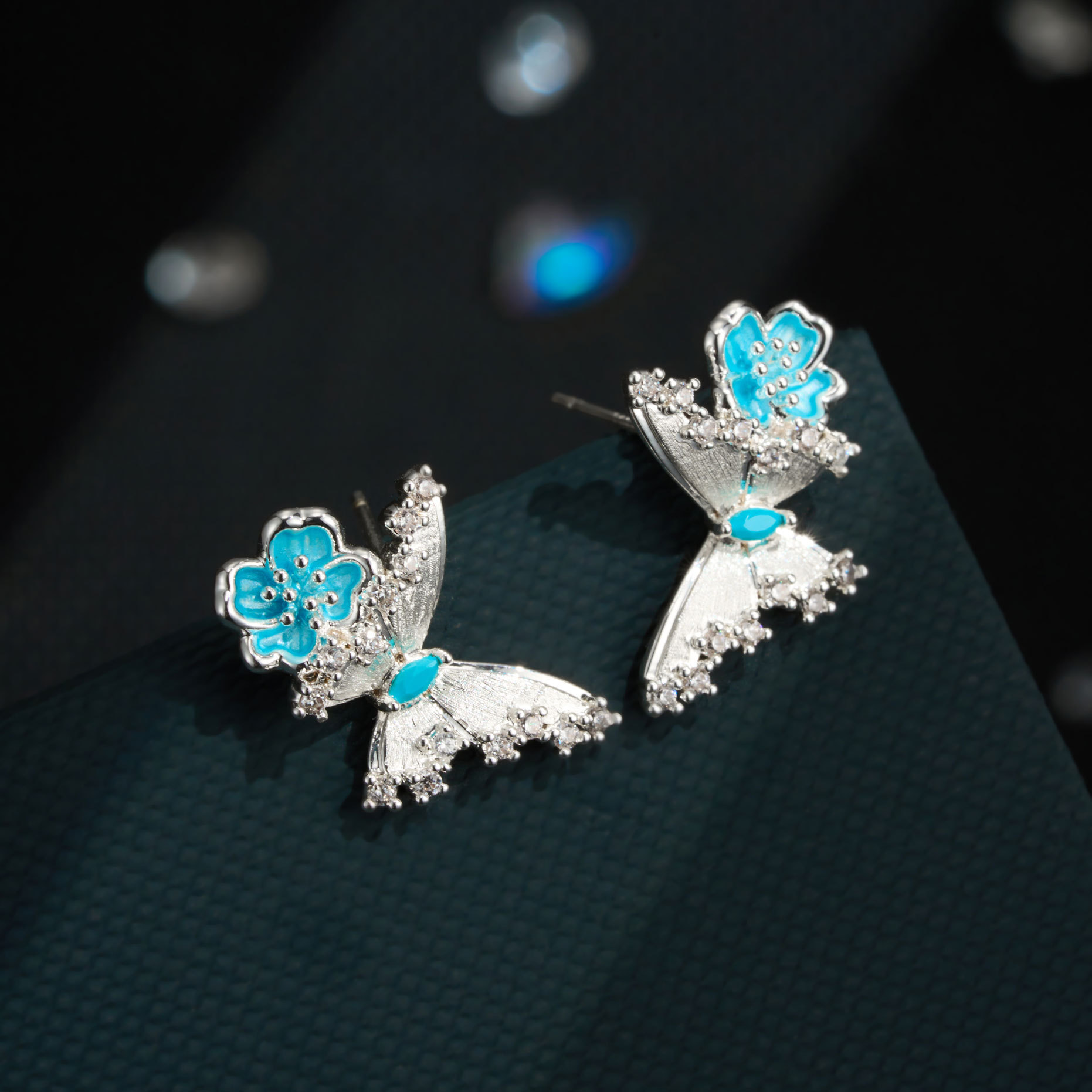 Spring and summer new ice blue enamel crabapple flower butterfly stud earrings, copper alloy brushed zirconium-inlaid s925 silver needle light luxury earrings details Picture