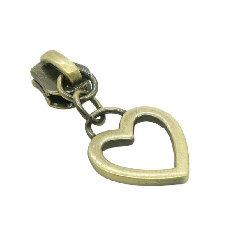 We have three-color metal luggage accessories in stock, including zipper pulls, hollow heart-shaped pull tabs, and custom zipper pulls Item Picture