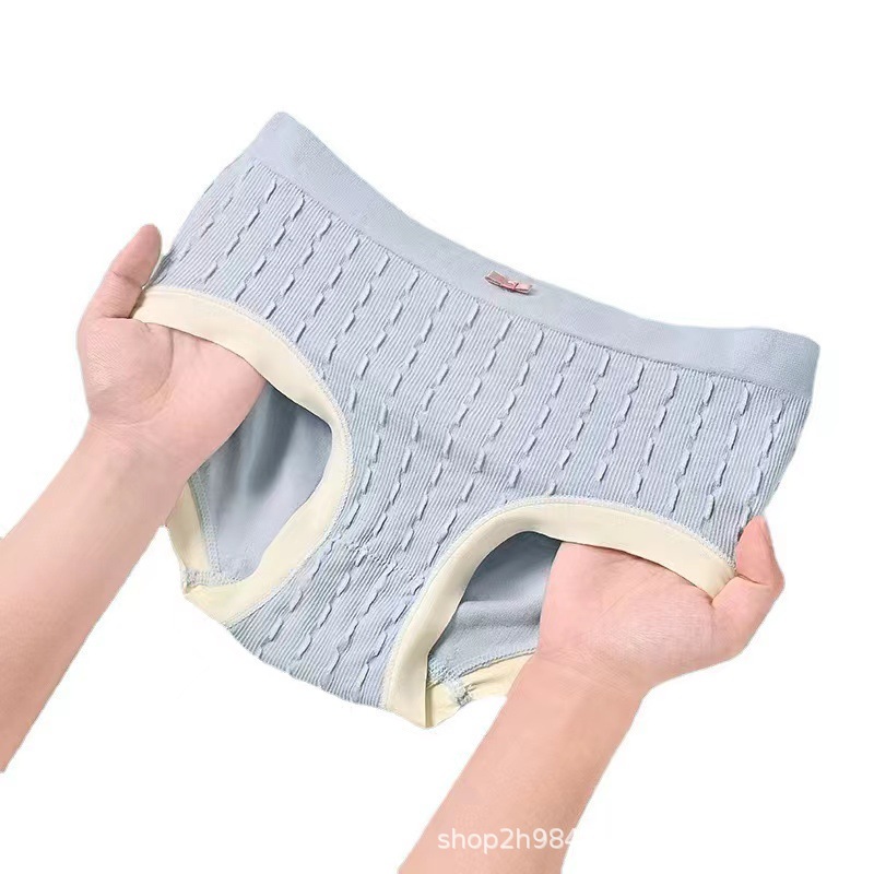 Export of mugwort underwear for Europe, America and Africa. Women's pure cotton crotch, sweet style, tuck in the abdomen, lift the buttocks, soft and pure, full buttocks, V-shaped triangular underwear Item Picture