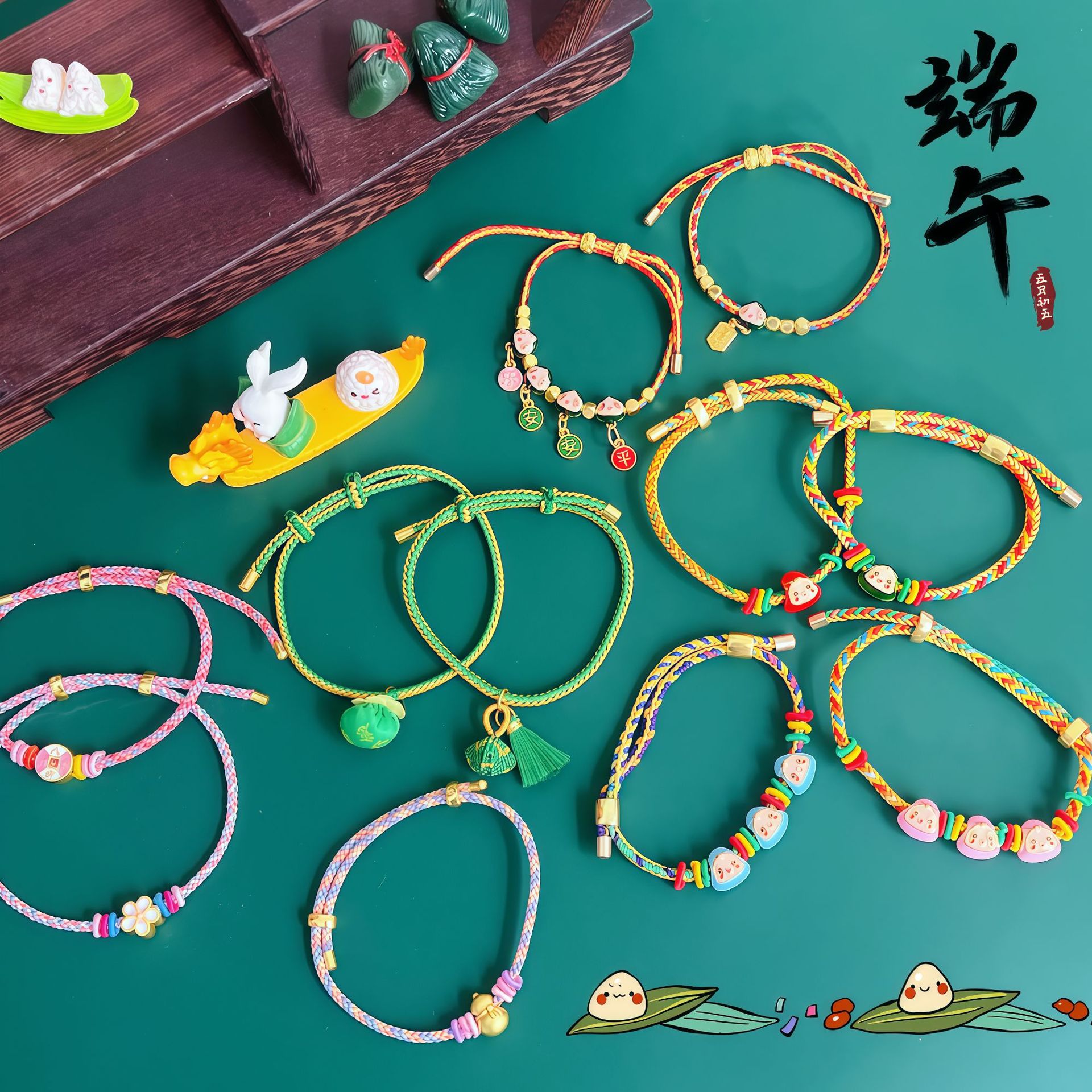 For the Dragon Boat Festival in 2025, there will be five-color rope bracelets, silver blessing zongzi, small dragon boats, and five-color thread woven bracelets for adults, children, and babies details Picture