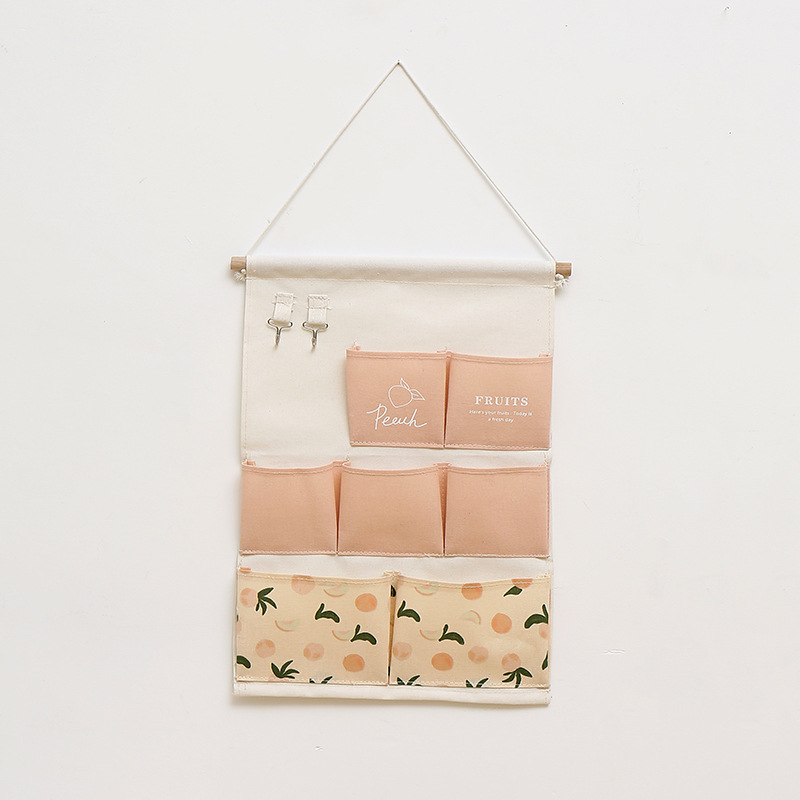 Wall-mounted storage bags, wall-mounted bags, wall-mounted door, wall-mounted shelf, wall-mounted bags, small cloth bags, dormitory room Application Scenario