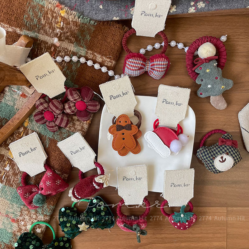 Korean-style cartoon Christmas hair band fabric children's gingerbread man sweet ponytail hair band high elasticity won't damage the hair elastic band details Picture