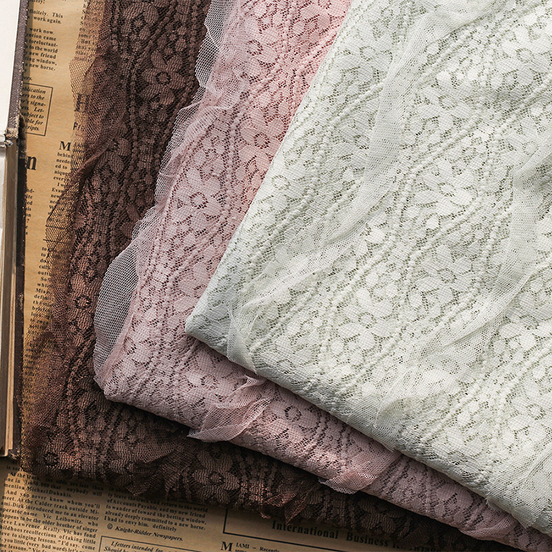 Lace wavy curved mesh fabric with black ear edge embroidery, small flower striped hook embroidery spring and summer forest-themed fabric in stock Application Scenario