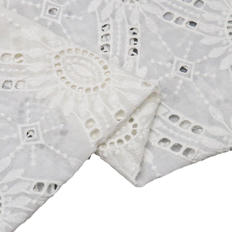 All-cotton embroidered fabric in stock, fashionable home textiles, children's wear, wedding gowns, evening gowns, halter straps, and lace fabric with hollowed-out patterns Item Picture