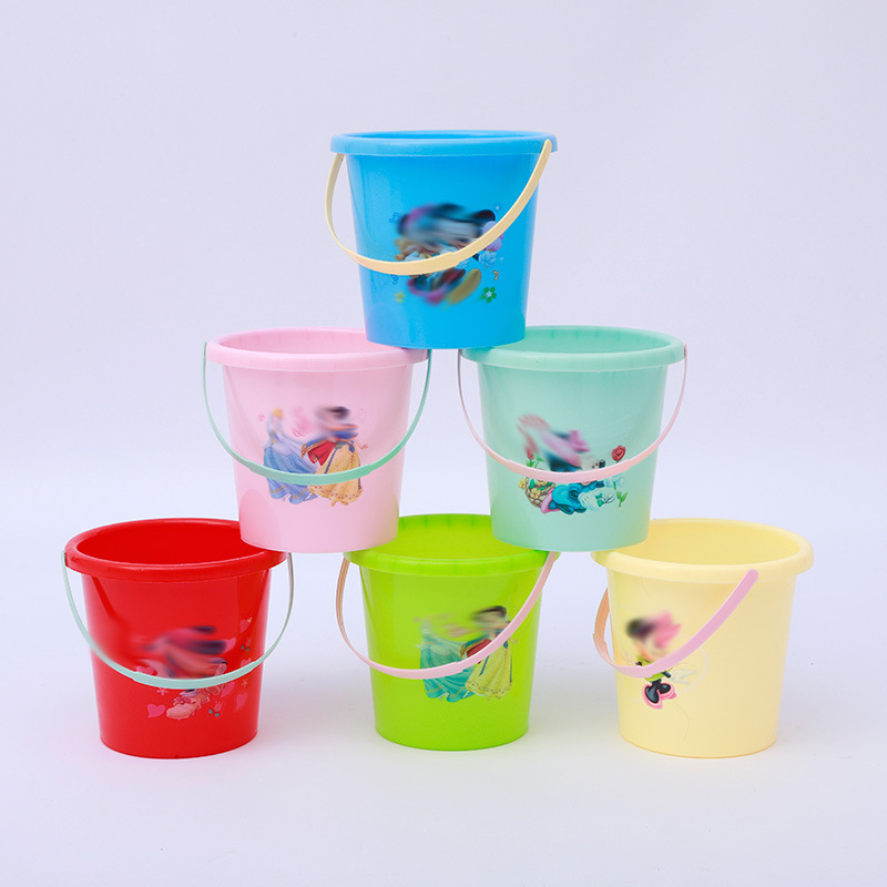 Children's beach toys of various sizes, plastic buckets, tools for babies to play with water, sand and snow, setting up stalls, fishing buckets, sand digging details Picture