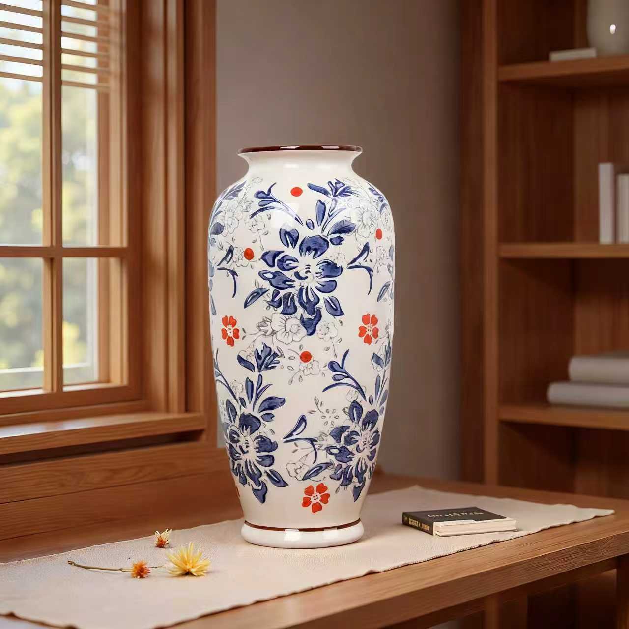 The blue and white porcelain hand-painted new Chinese-style retro peony flower ceramic vase has a high aesthetic level. It is a fresh flower arrangement for the living room entrance. The blue and white porcelain vase embellishes the elegant room. The flower shadows in front of the window, the fragrance of books accompanies the tranquility