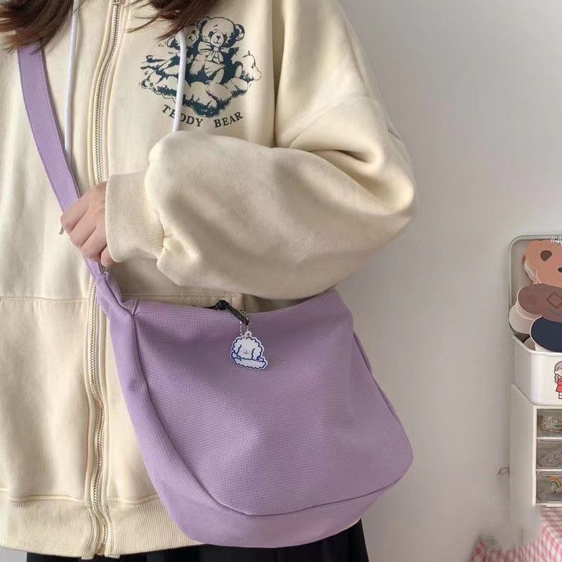 Cross-border Waffle dumpling bag, fashionable and simple Korean style, versatile, daily trend, candy color, women's single-shoulder crossbody bag, handbag, hand-carry dumpling bag Application Scenario
