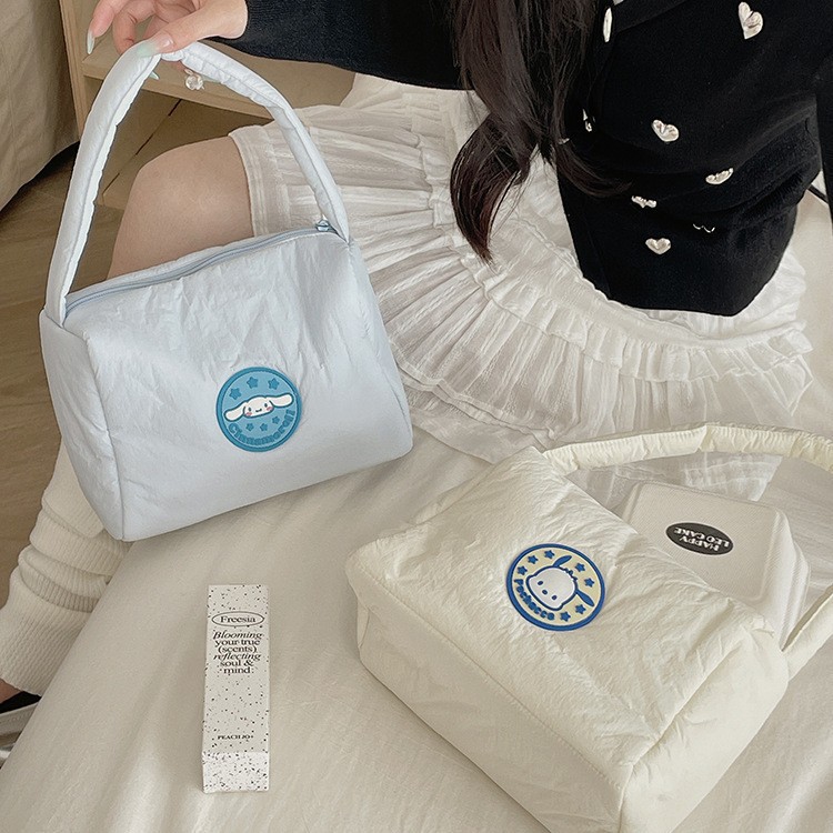 Officially authorized Sanlio cosmetic bag, Japanese and Korean fresh down fabric with cotton, hand-held small bag for girls, Kuromi Item Picture