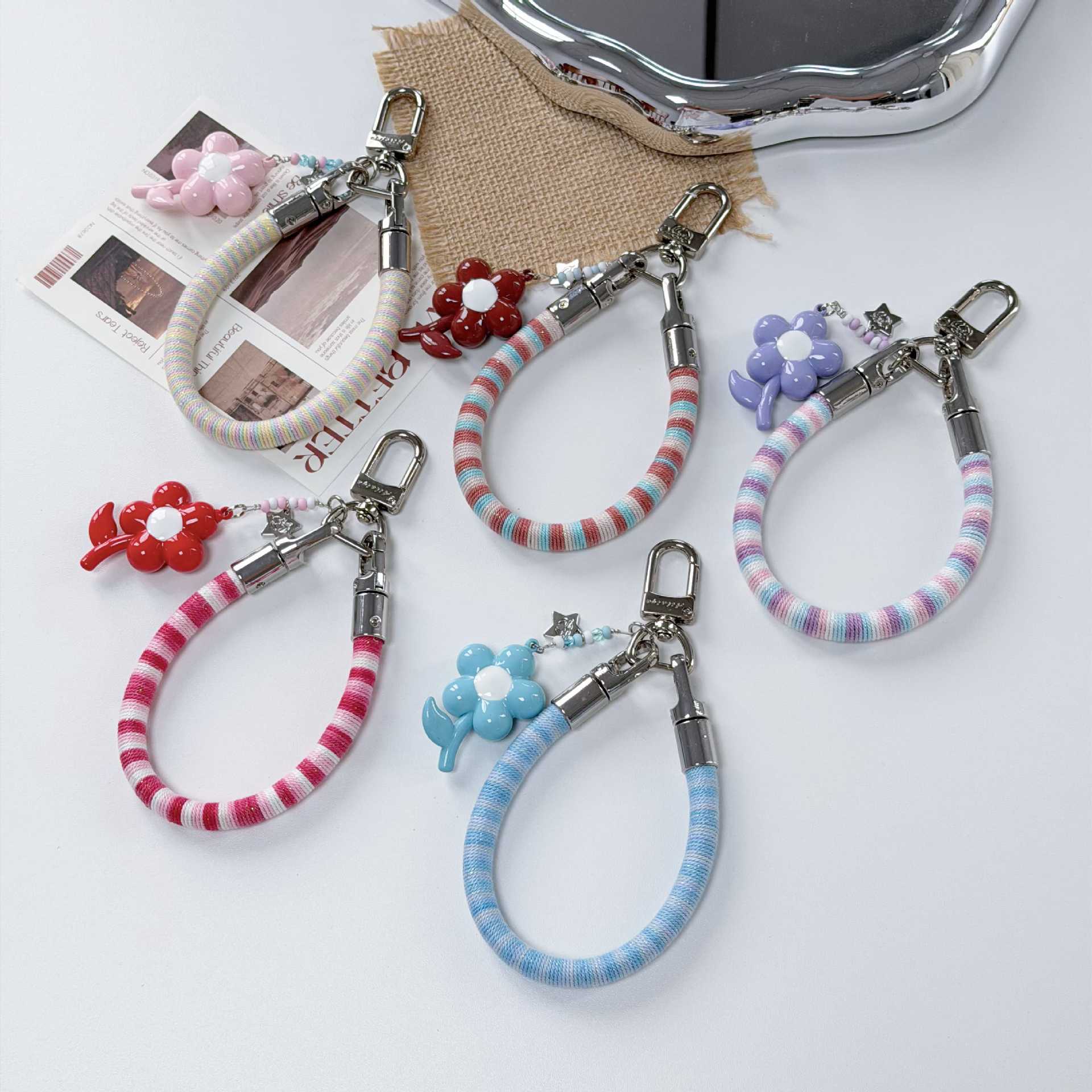 Cotton loop woven mobile phone lanyard, bracelet, small flower pendant, cute and versatile lanyard, bag pendant, anti-loss and firm details Picture