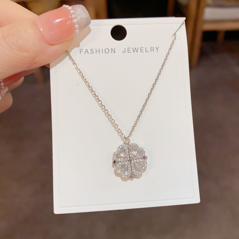 Four-leaf flower magnetic heart-shaped necklace for women, light luxury, fashionable and individual sweater chain, high-end and versatile collarbone chain accessory details Picture