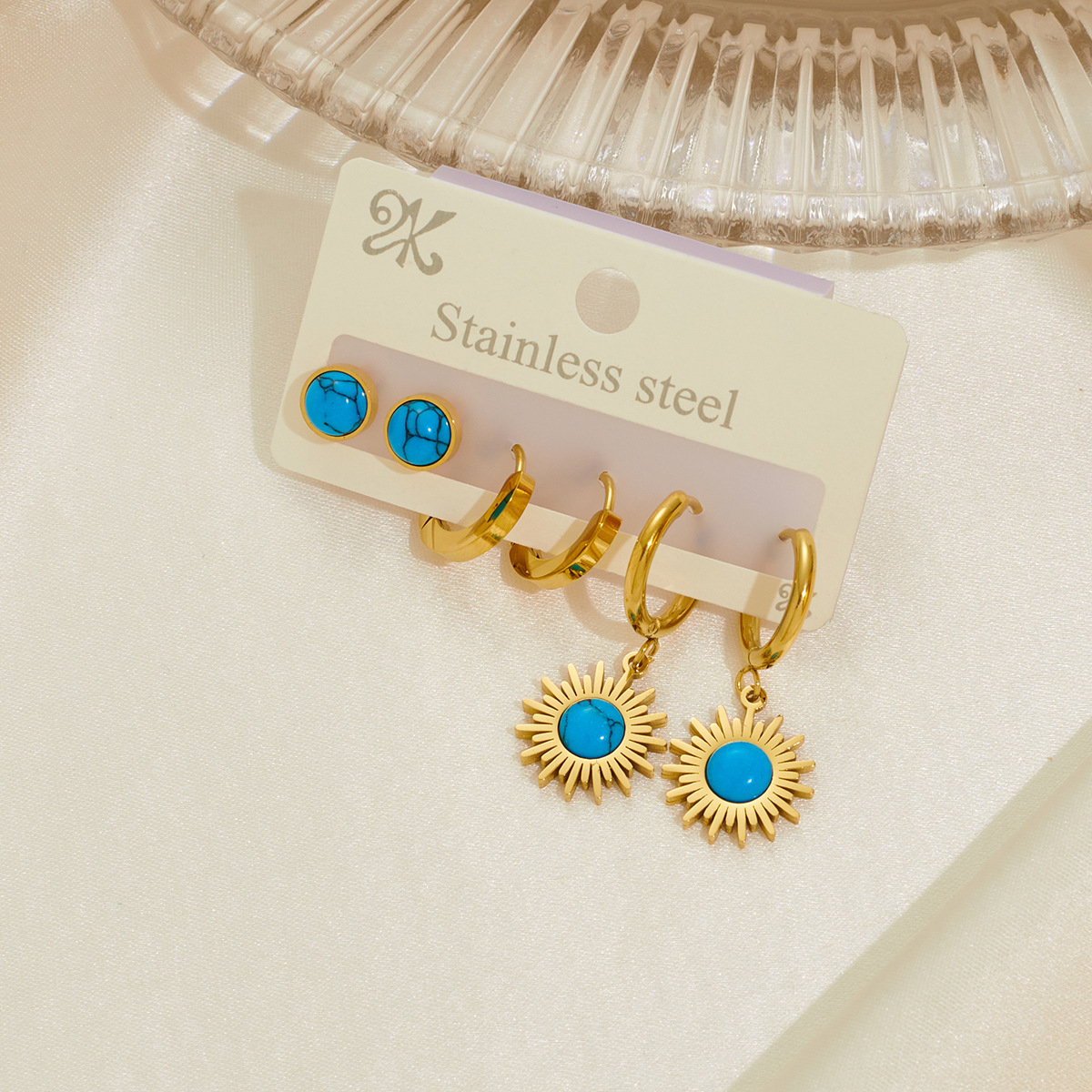 New titanium steel diamond-encrusted earring set, simple and fashionable hollowed-out star and moon drop earrings, women's factory wholesale Application Scenario