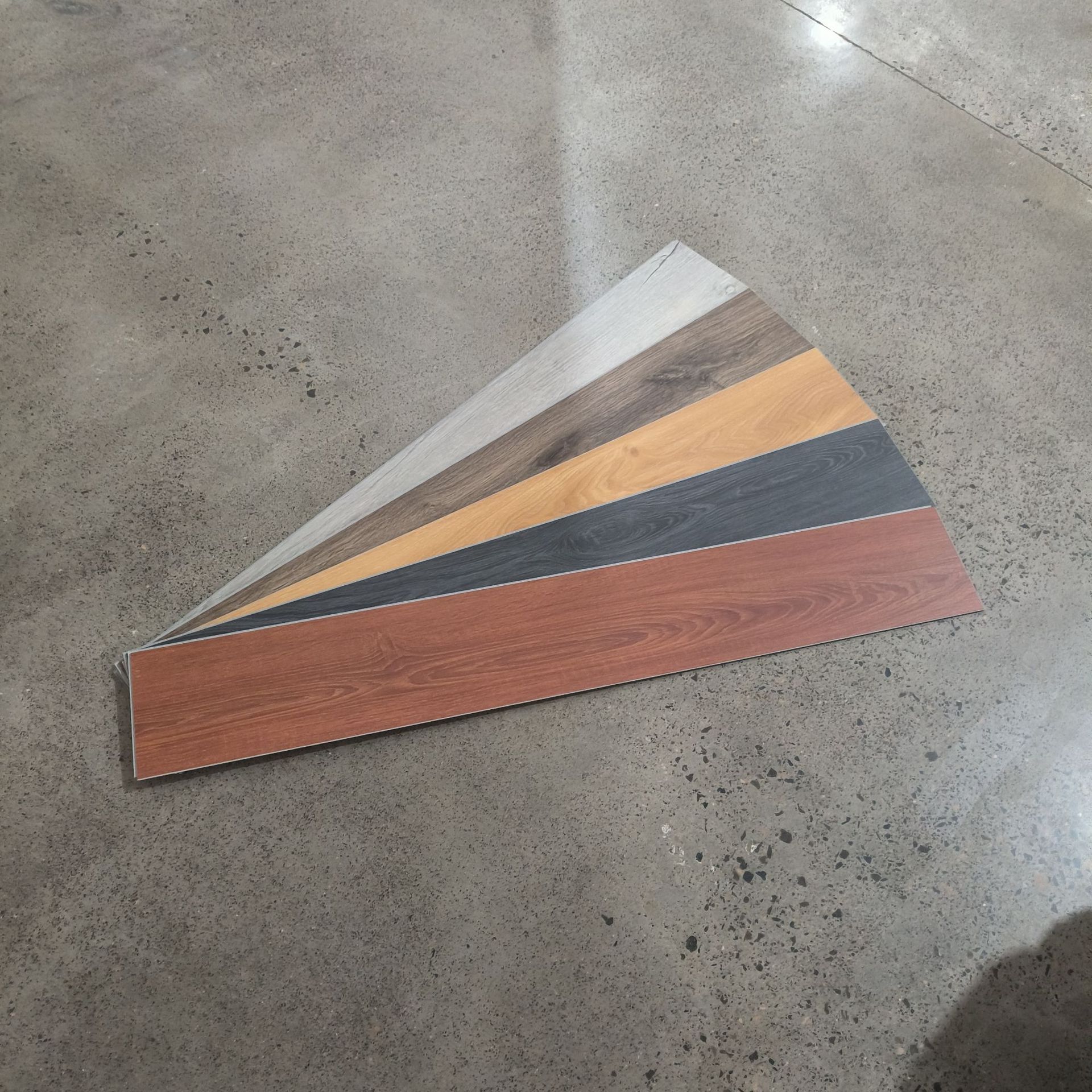 Zhejiang solid wood pattern spc stone plastic locking floor, a new type of formaldehyde-free, waterproof and flame-retardant stone crystal floor Application Scenario