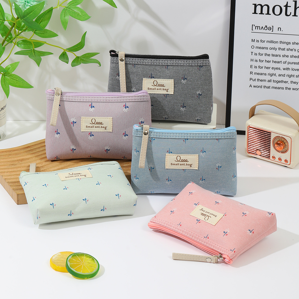 Cross-border printed canvas cosmetic bag, waterproof portable for women, Ins-style letter student pen case, travel storage toiletry bag