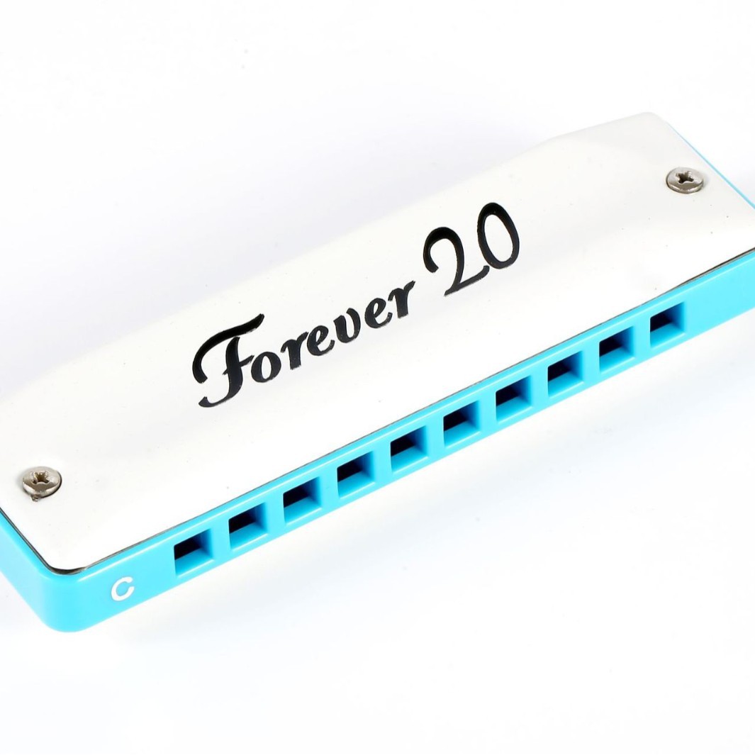 口风琴/乐器/足球/儿童玩具/小号乐器白底实物图