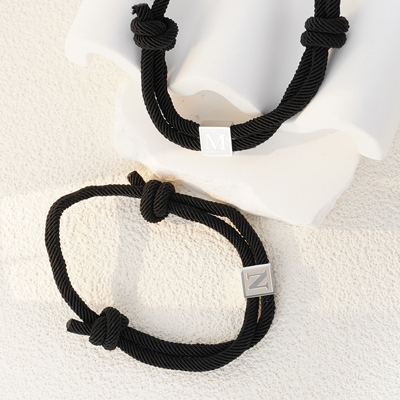 European and American cross-border nylon rope first letter bracelet, titanium steel 26-letter pendant bracelet, hand-woven adjustable bracelet Application Scenario
