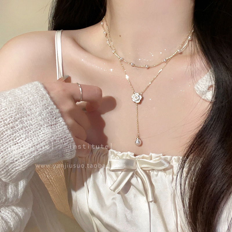 Light luxury and niche design sense double-tassel pearl necklace, women's super fairy-like camellia collarbone chain, wholesale Application Scenario