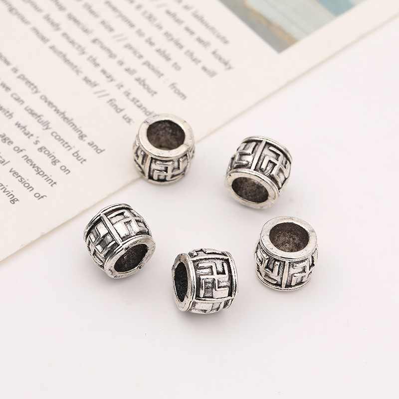 Wholesale of retro Tibetan silver patterned auspicious cloud pattern bucket beads, partition beads, wheel beads, diy handcrafted bracelets and accessories Application Scenario