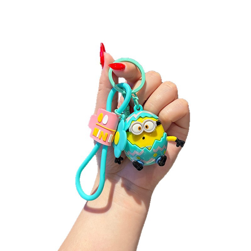 Wholesale of genuine cartoon egg Minions keychains, creative couple bags, figurines, key chains and pendants from Fuqilai Item Picture