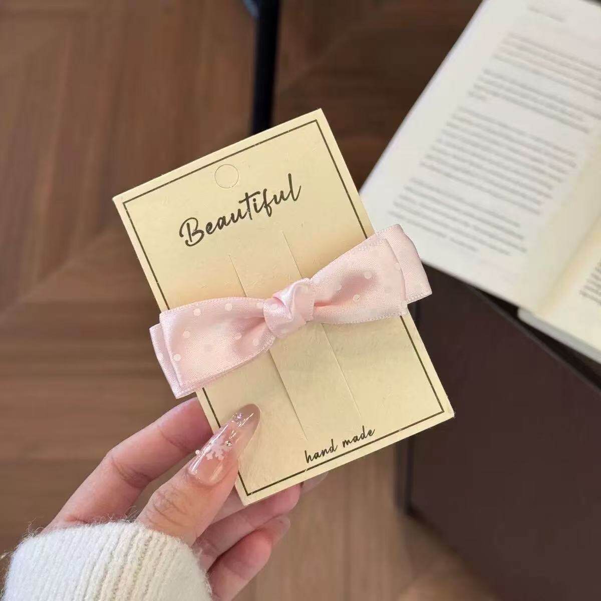 Spring and summer polka dot bow ducktail clip with a sweet and girlish heart, side bangs with a Korean ins-style fresh hair clip Item Picture