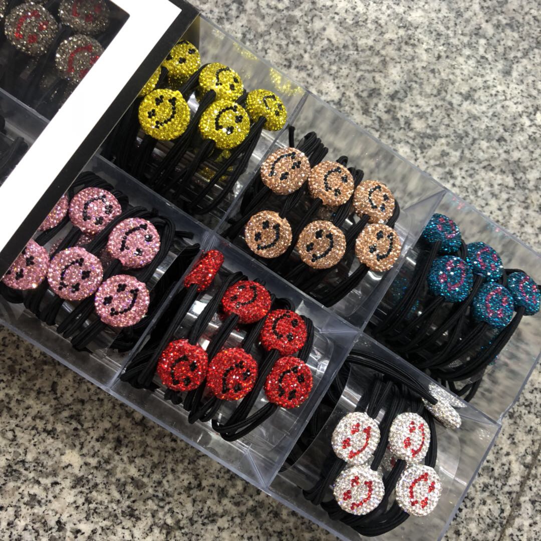 Korean version sequined smiley face hair band, three-in-one leather band hair tie, new knotted hair tie, 2-yuan store supply, factory direct sales