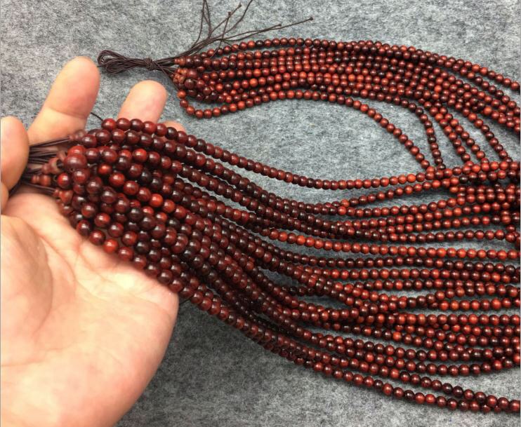 紫檀木佛珠手串0.6*108粒紫光檀佛珠珠手串细节图