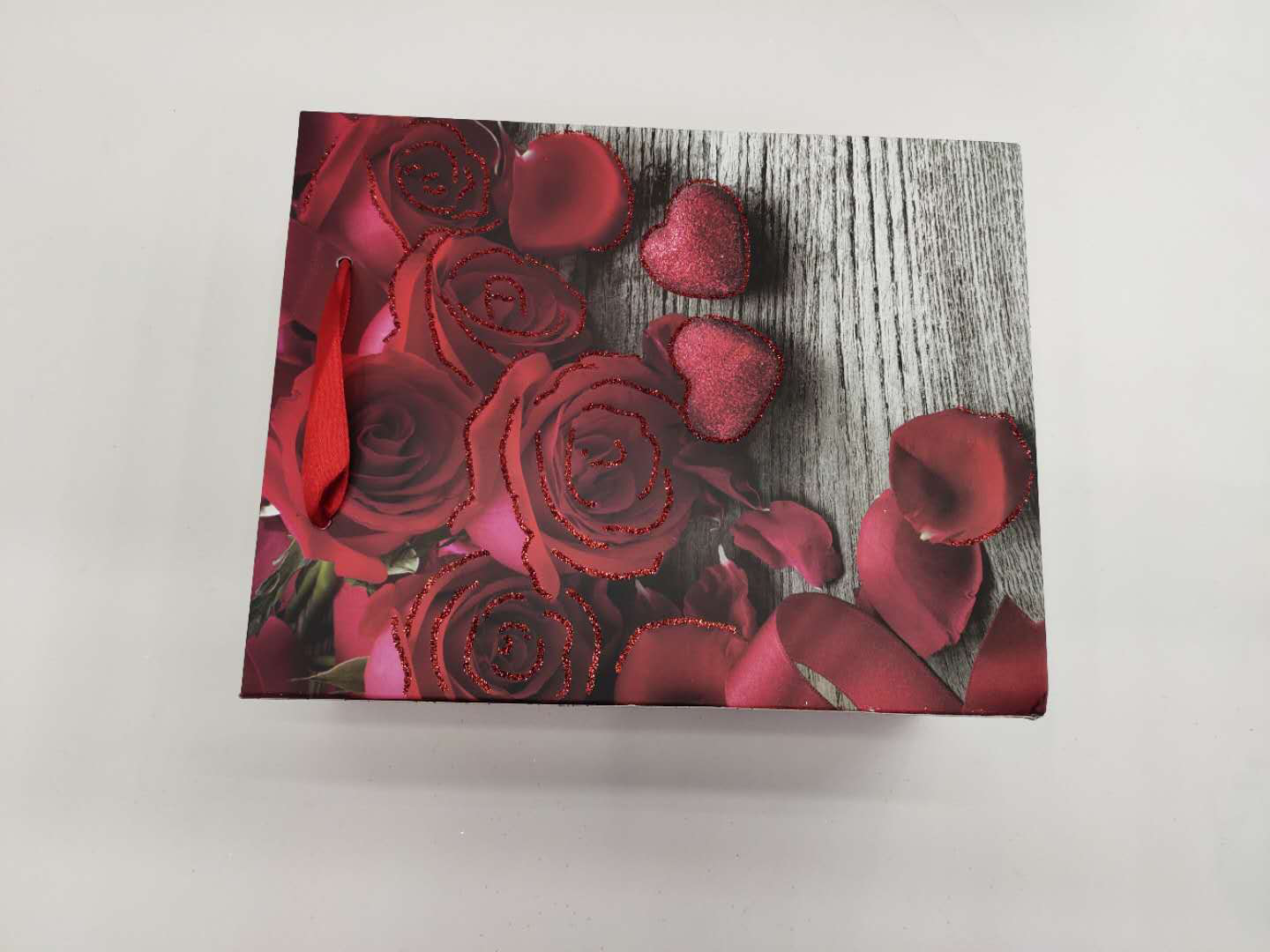 厂家批发玫瑰花撒粉礼品袋四色混手提袋产品图