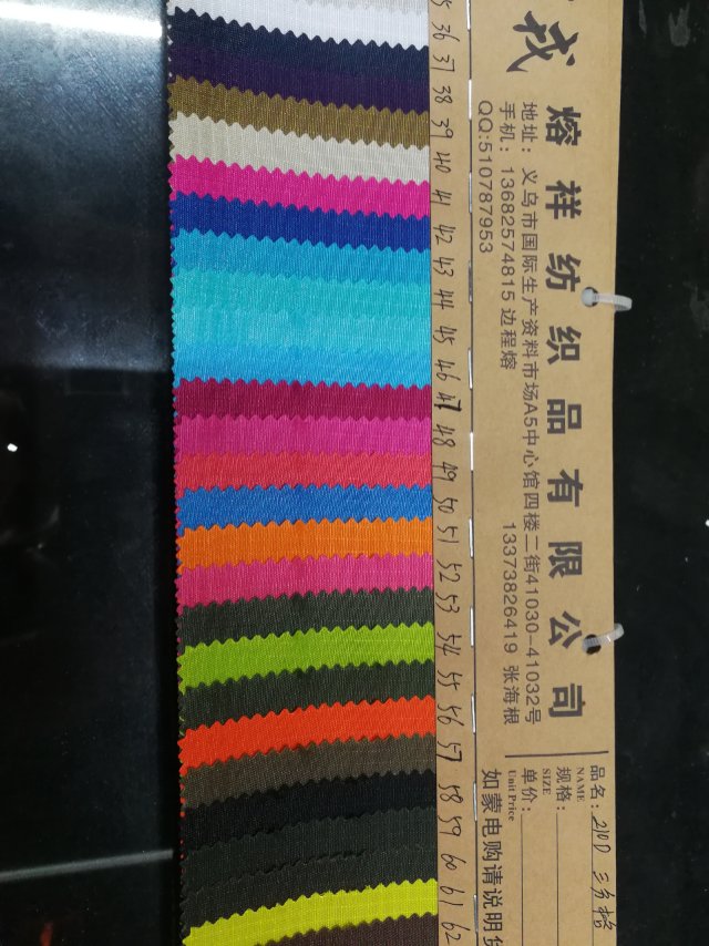 厂家直销热销新款格子布210d三分格皮革大量现货高中低档箱包沙发鞋材面料