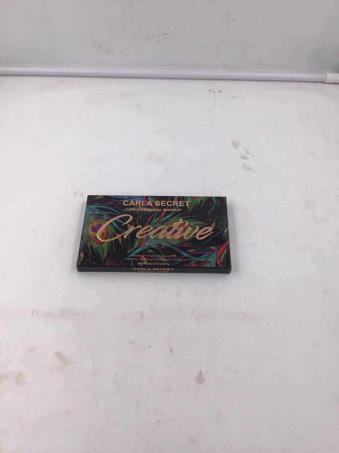 卡拉之谜凤凰羽毛烫金激凸24色网红眼影盘E98