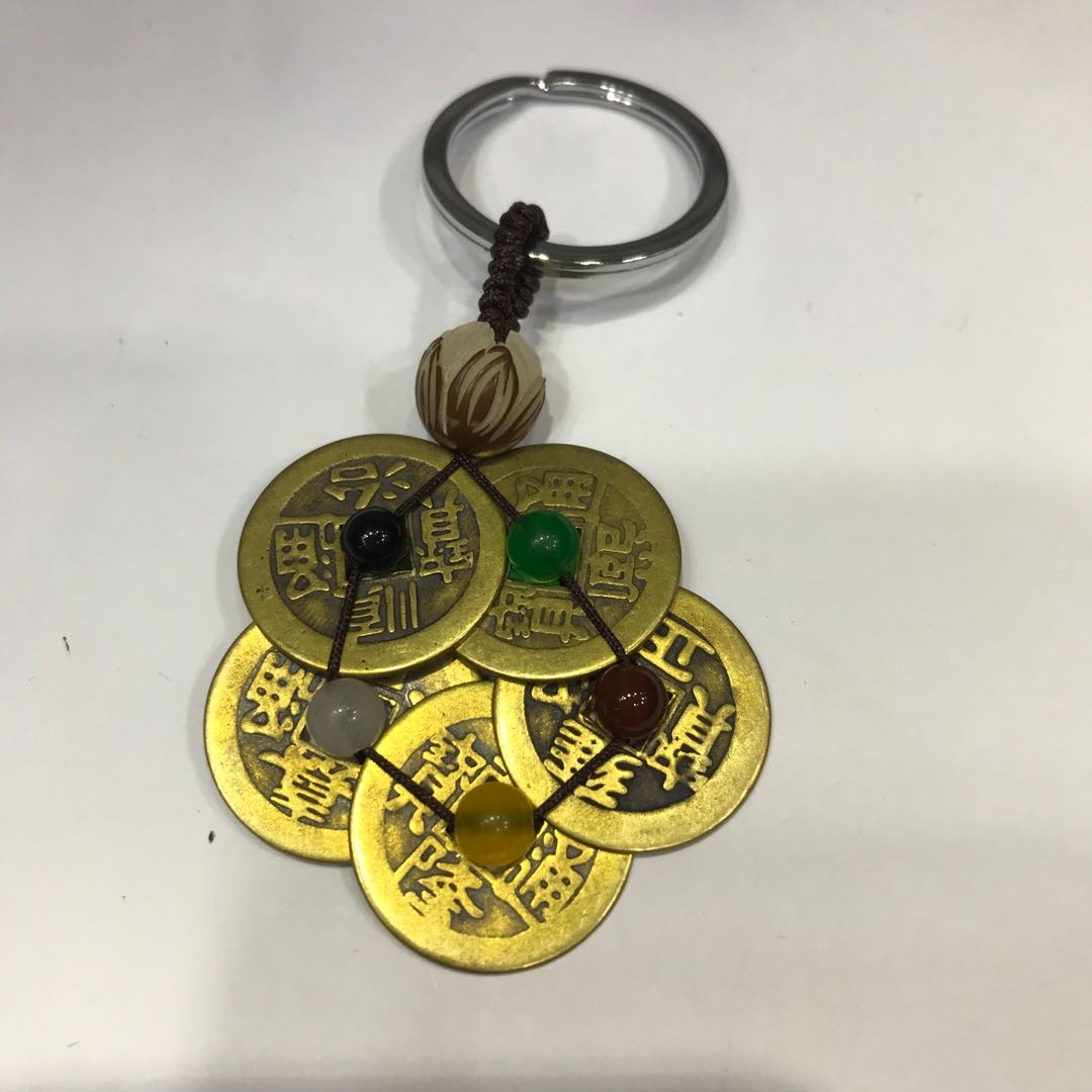 A pure copper five-emperor coin car keychain pendant for both men and women to carry with plum blossoms