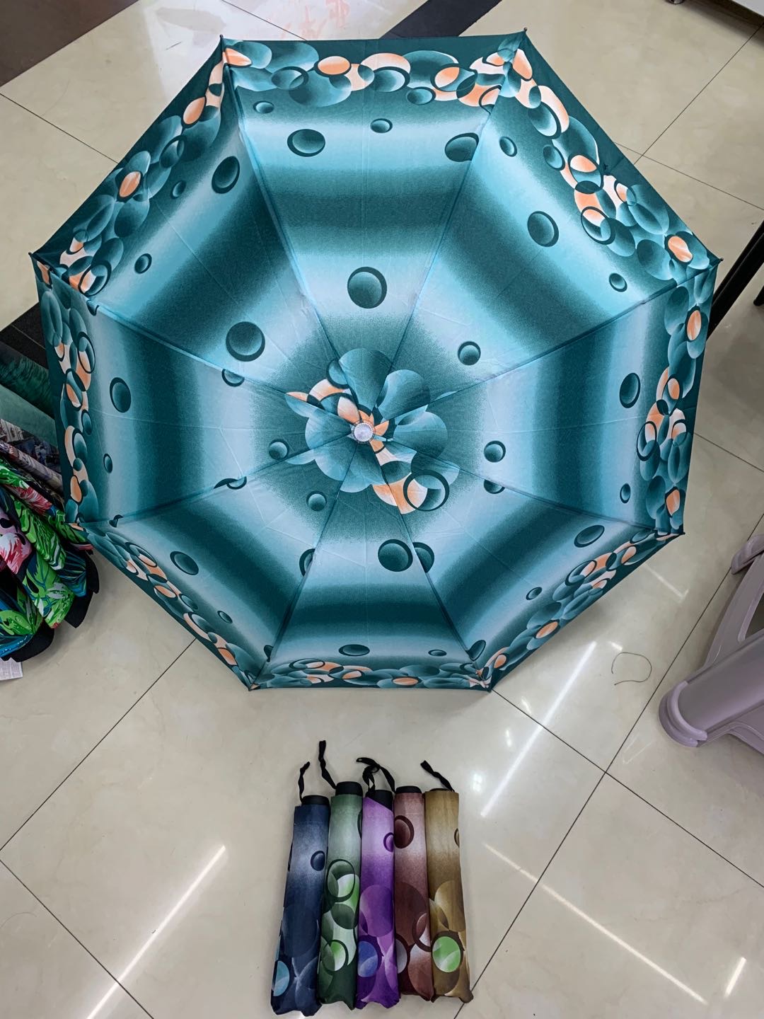 Portable three-fold umbrella with floral fringes for both weather and rain