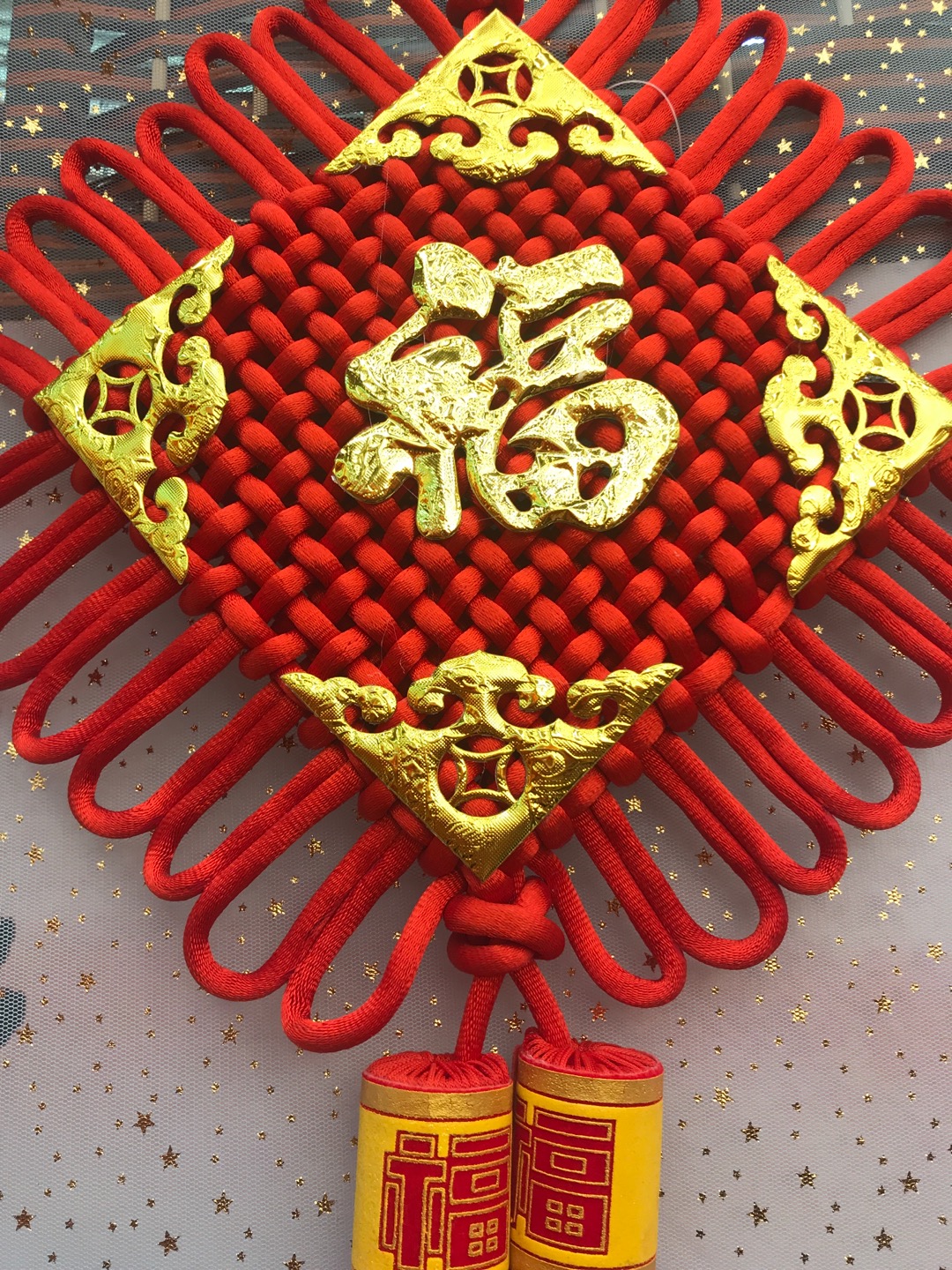Chinese knot displayed during a wedding ceremony setup