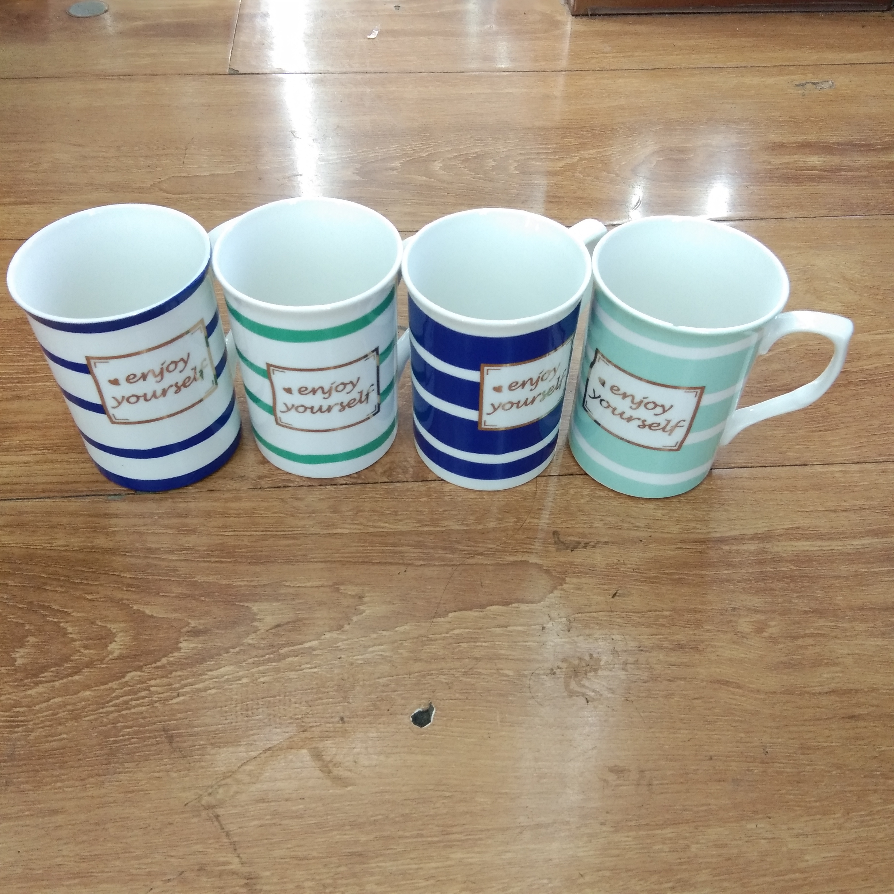 Wholesale of ceramic striped letter cups, creative mugs and various household cups