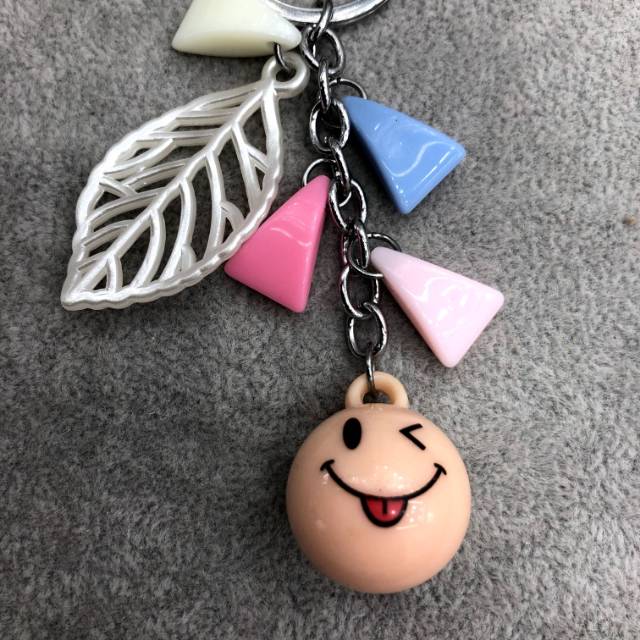 Smiling, round ball keychain pendant, bag accessory, cute little girl details Picture