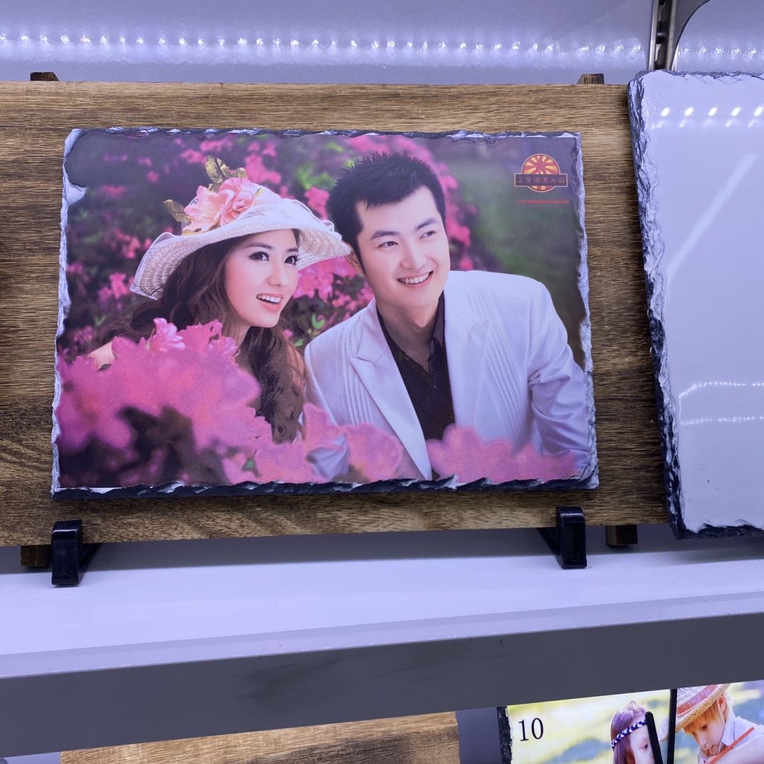 The wooden couple photo frame decorative item stand is integrated