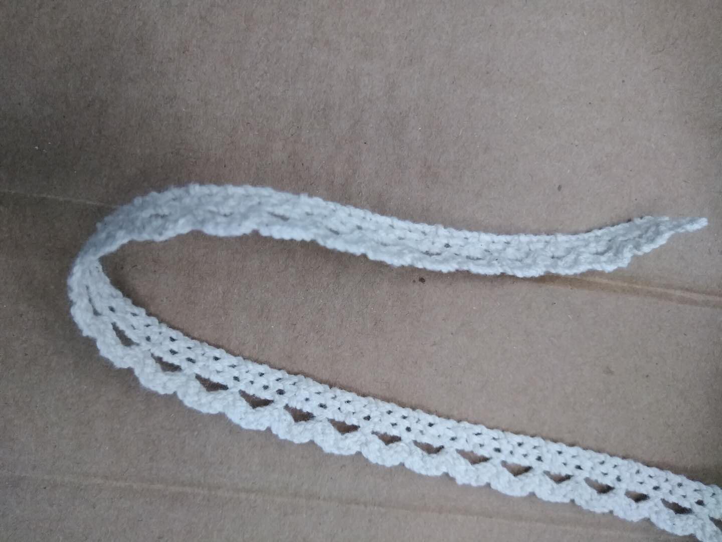 Fashionable cotton thread lace is available in stock for a variety of uses, including small floral trims Specification image