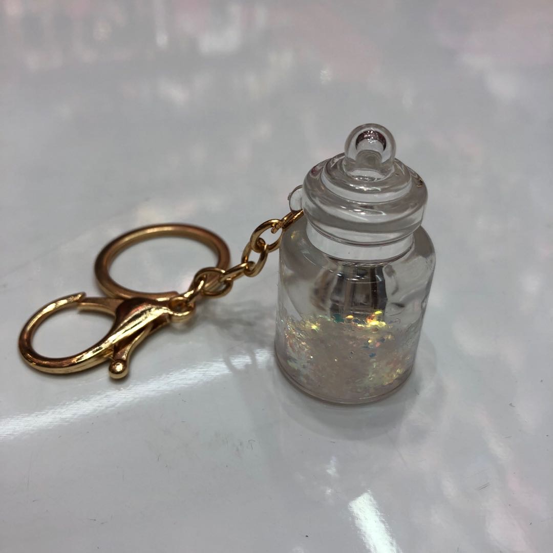 Manufacturers direct key chain flash bottle pendant