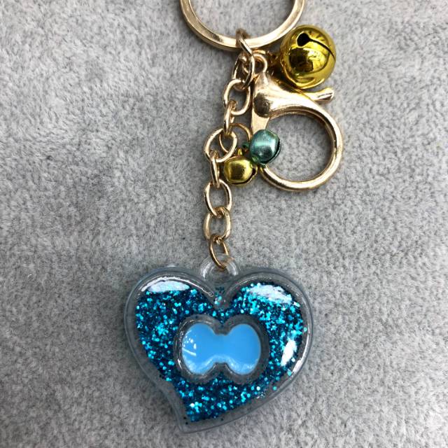 A girl's cute cherry blossom star sand bag key chain pendant, metal key chain pendant, Korean accessory details Picture