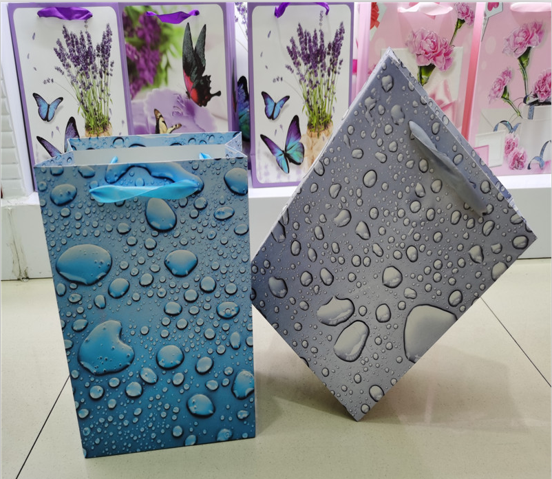 Raindrop gift handbag, UV gift bag, water drop hand-held paper bag, dew shopping clothing bag customization details Picture