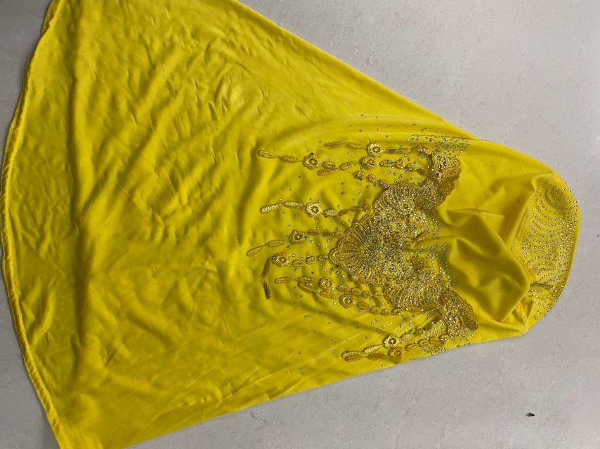 A female Muslim headscarf with fixed beads and rhinestones