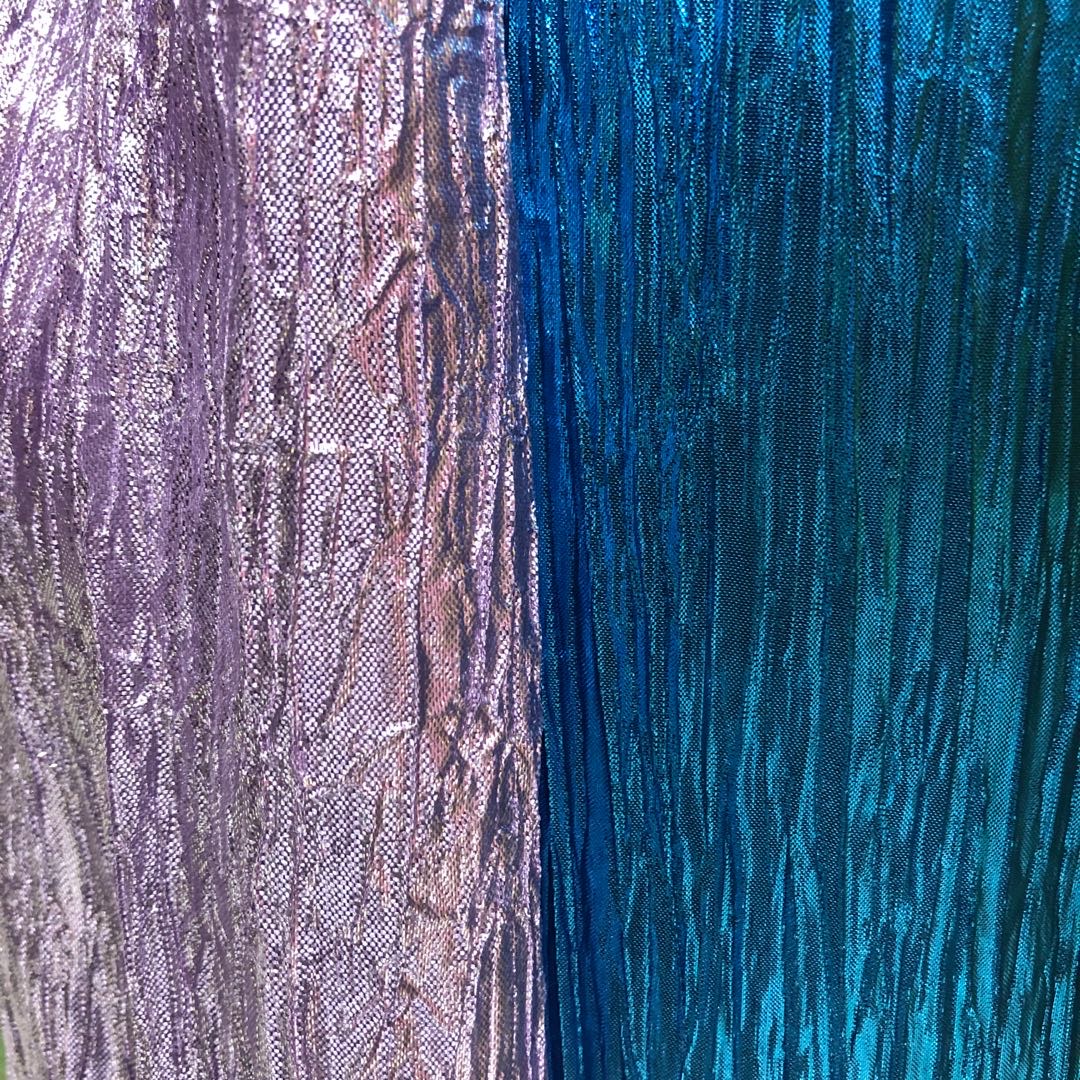 Gold and silver pleated fabric is available in multiple colors in stock. The fabric manufacturer sells directly. New products of the season are available for wholesale or retail