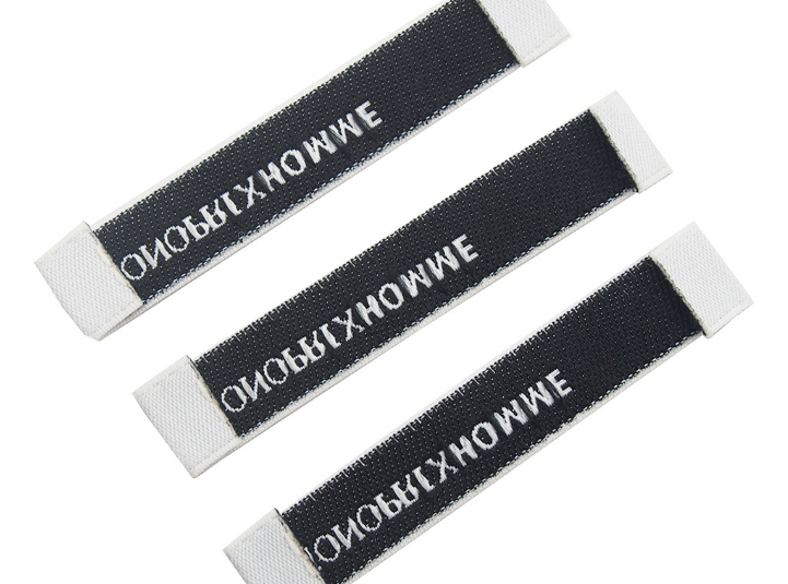 新款织唛商标服装领标家纺毛巾布标勾边50D缎面织唛产品图